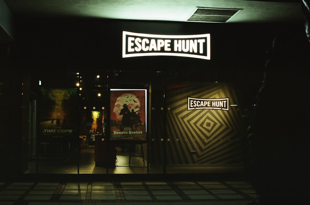 Escape Hunt entrance sign at night